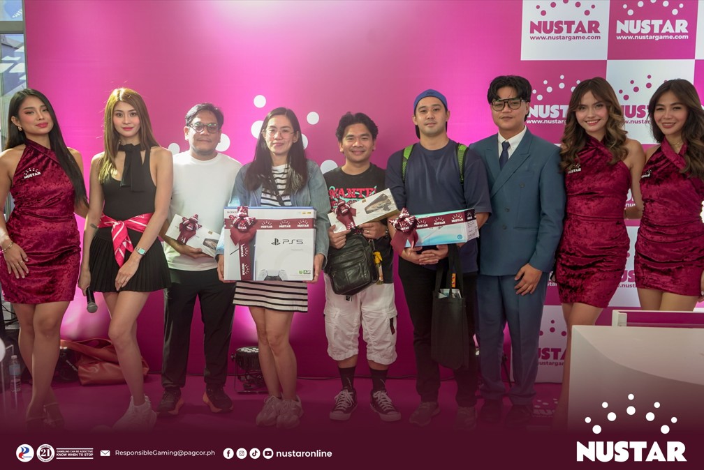 nustar online brand manager alex barcela (third from right), exclusives host aria (second from left), and brand ambassadors pose for a photo with the raffle draw winners at the center